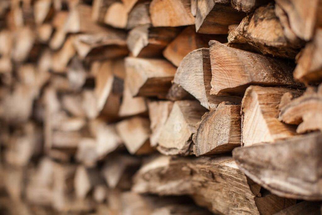 logs of wood stacked up for fire